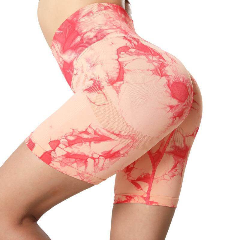 Seamless sports short scrunch butt shorts for women in pink tie-dye, featuring high waist and slim fit, perfect for active lifestyles.
